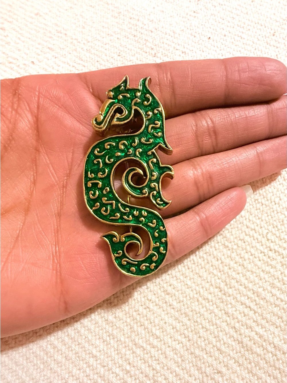 Vintage ROM green enamel and gold-tone seahorse/seadragon brooch